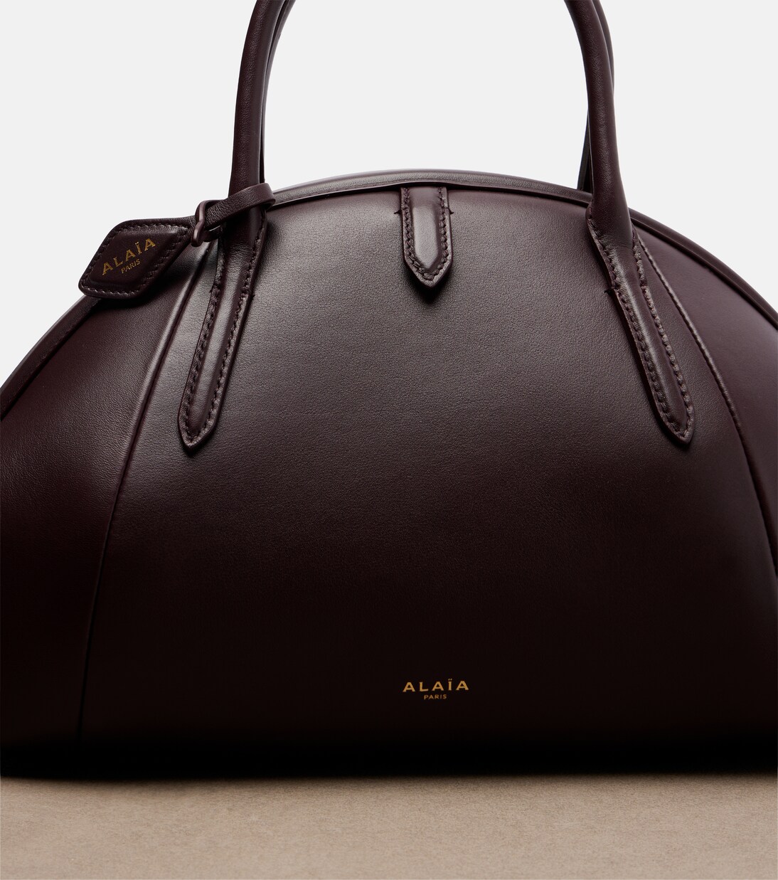 Purse Small leather top-handle bag | Alaïa