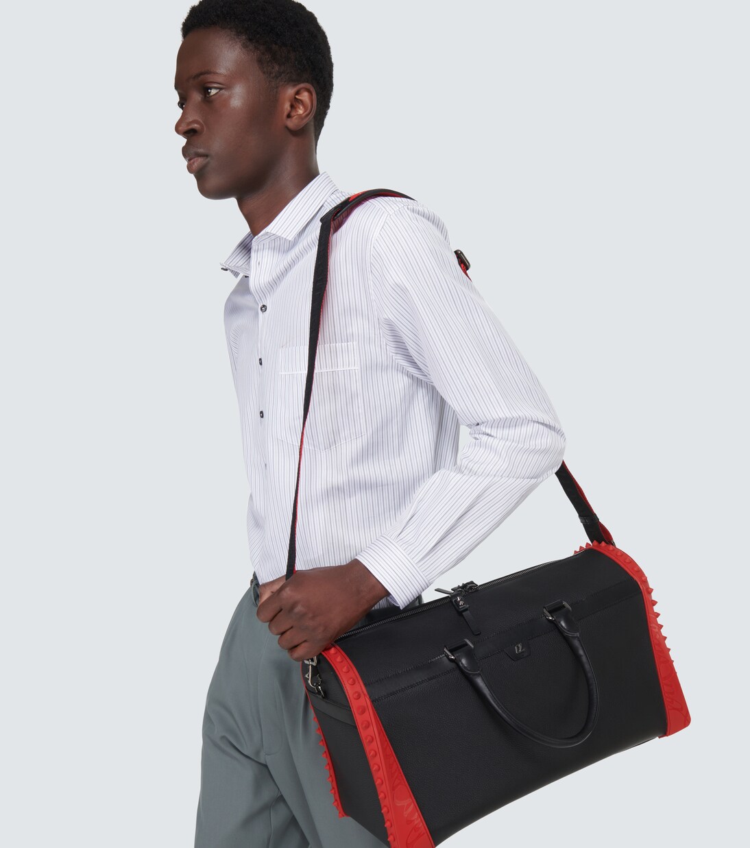 Sneakender spiked leather duffel bag | Christian Louboutin