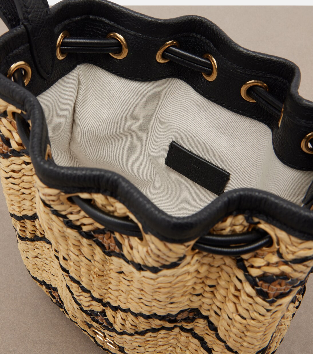 VLogo Mini raffia bucket bag | Valentino Garavani