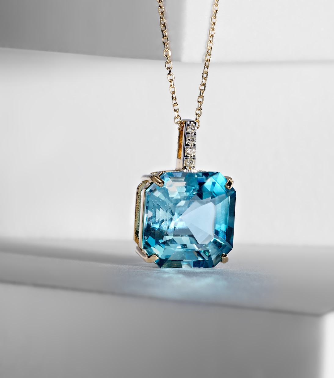 14kt gold necklace with topaz and diamonds | Mateo