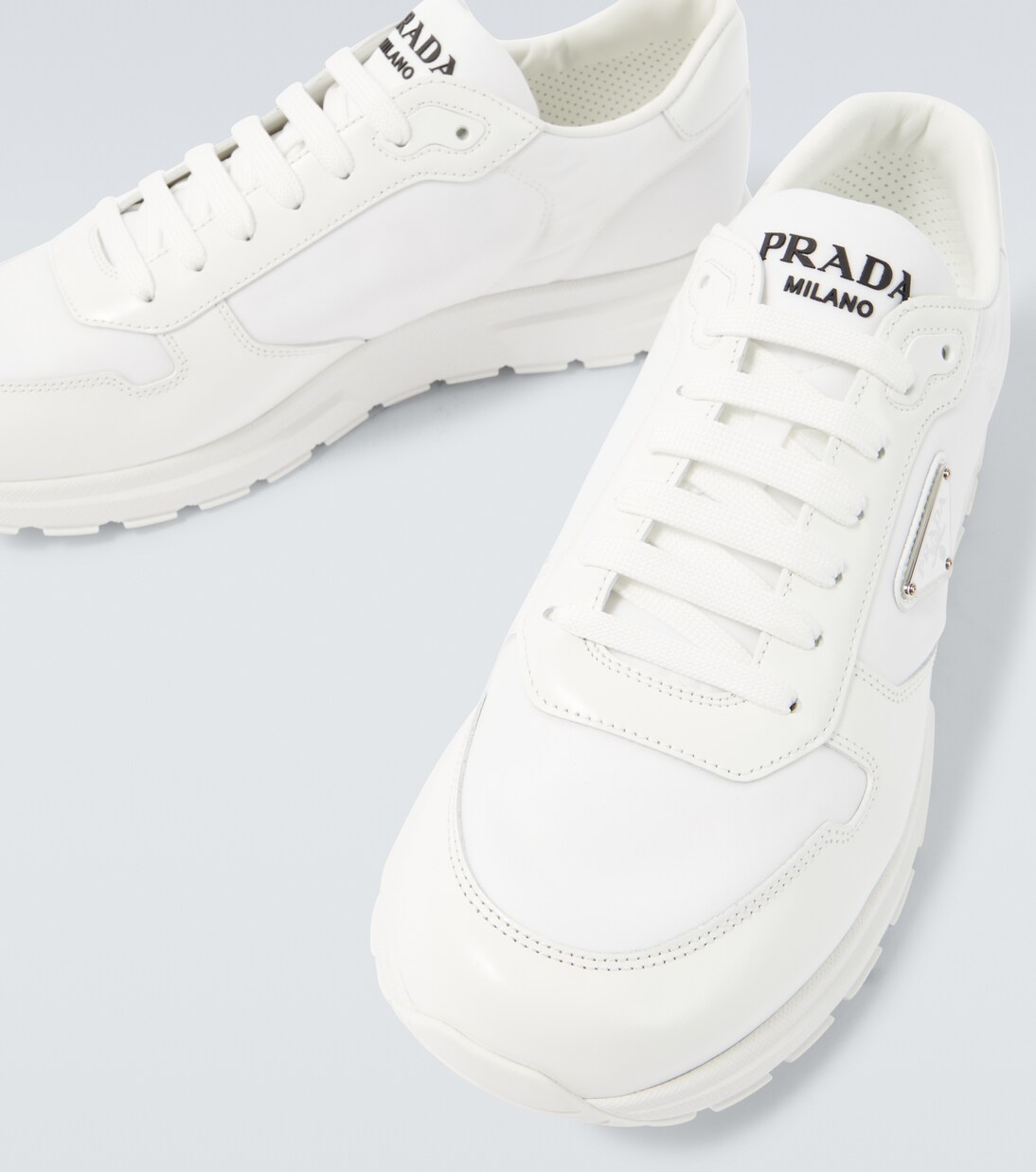 Logo leather-trimmed sneakers | Prada