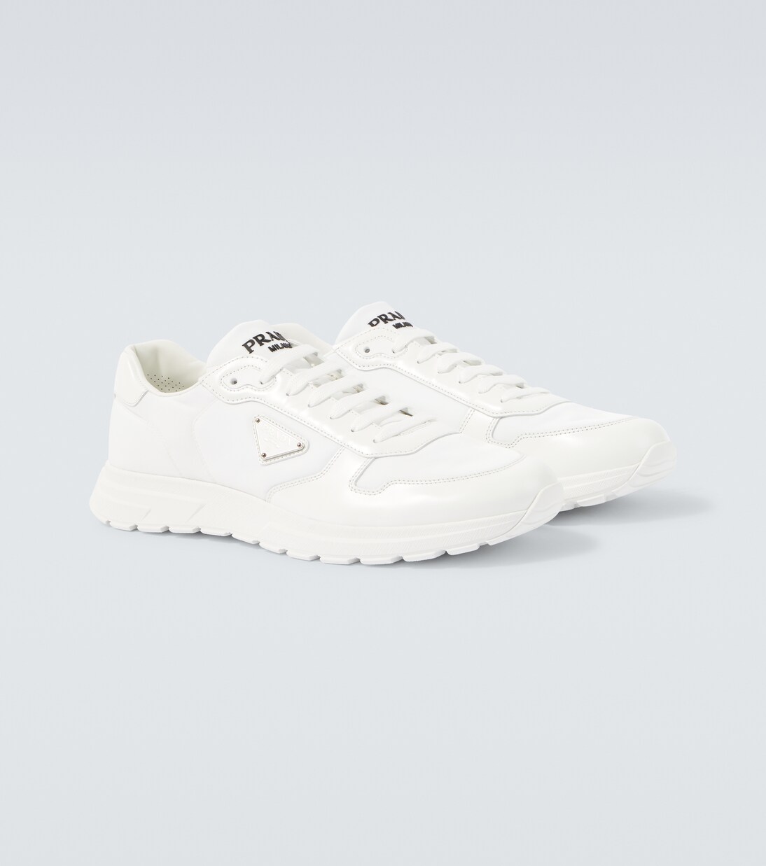Logo leather-trimmed sneakers | Prada