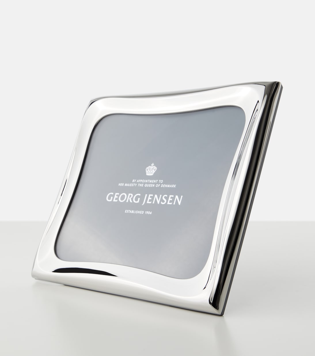 Cobra stainless steel picture frame by Constantin Wortmann | Georg Jensen
