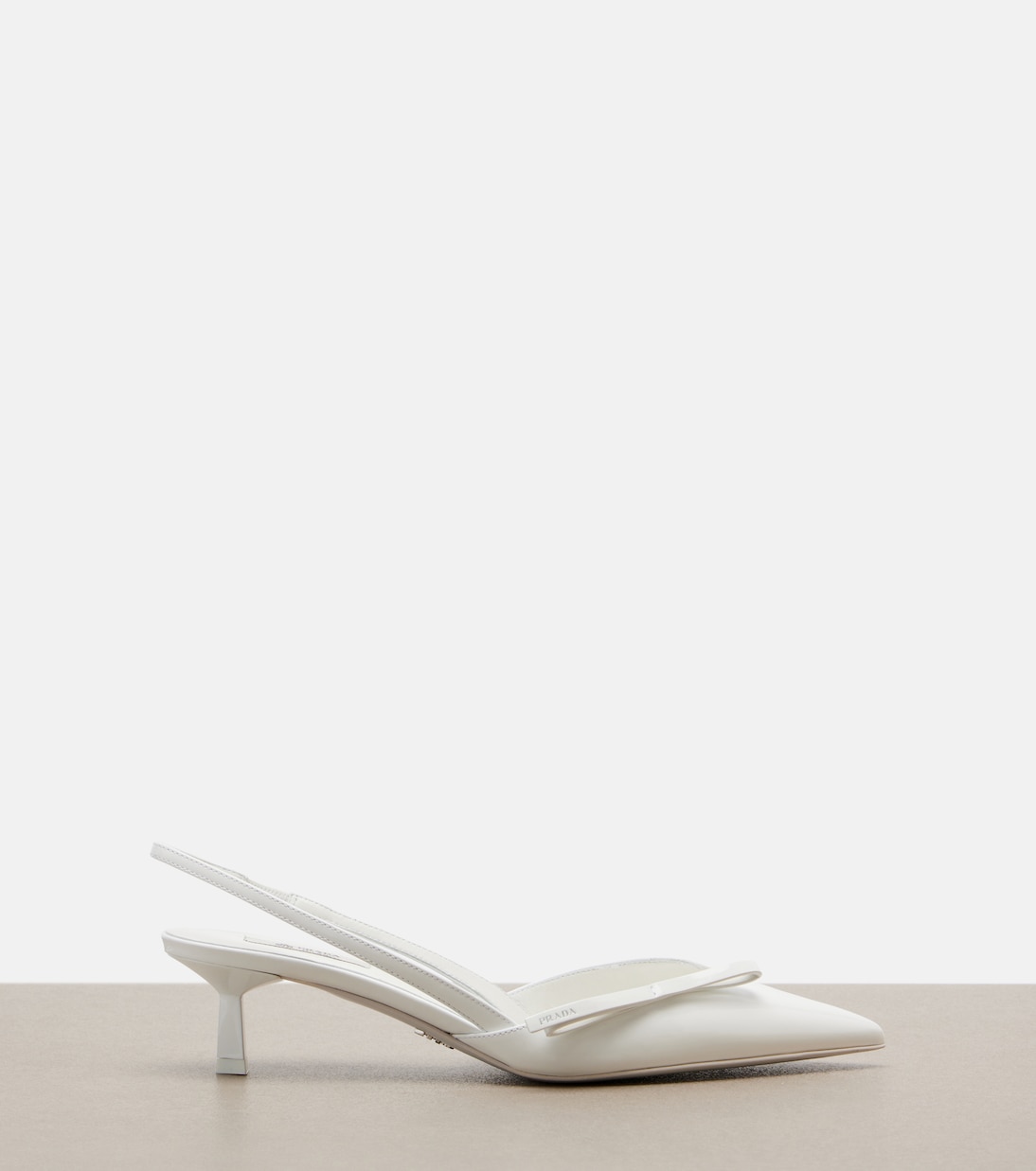 Patent leather slingback pumps | Prada