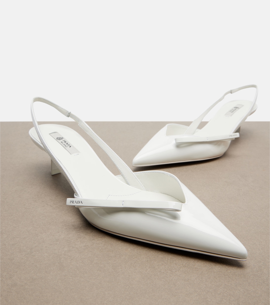 Patent leather slingback pumps | Prada