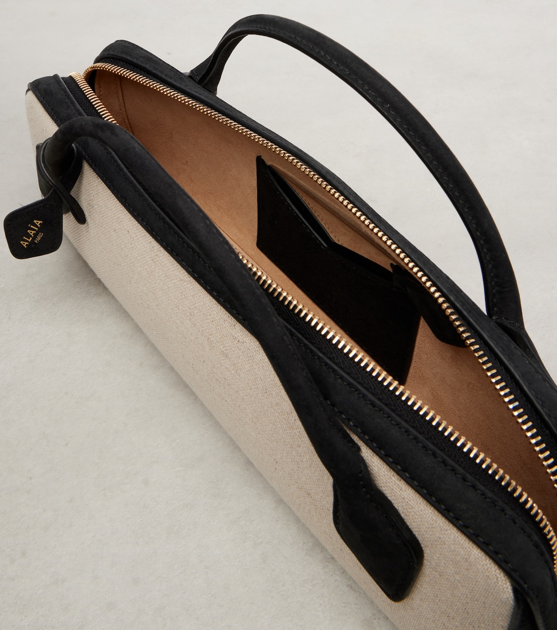 Le Teckel canvas clutch | Alaïa