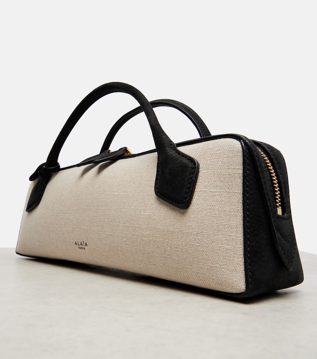 Le Teckel canvas clutch | Alaïa