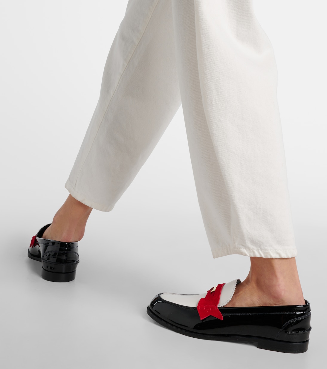 Penny suede-trimmed patent leather penny loafers | Christian Louboutin