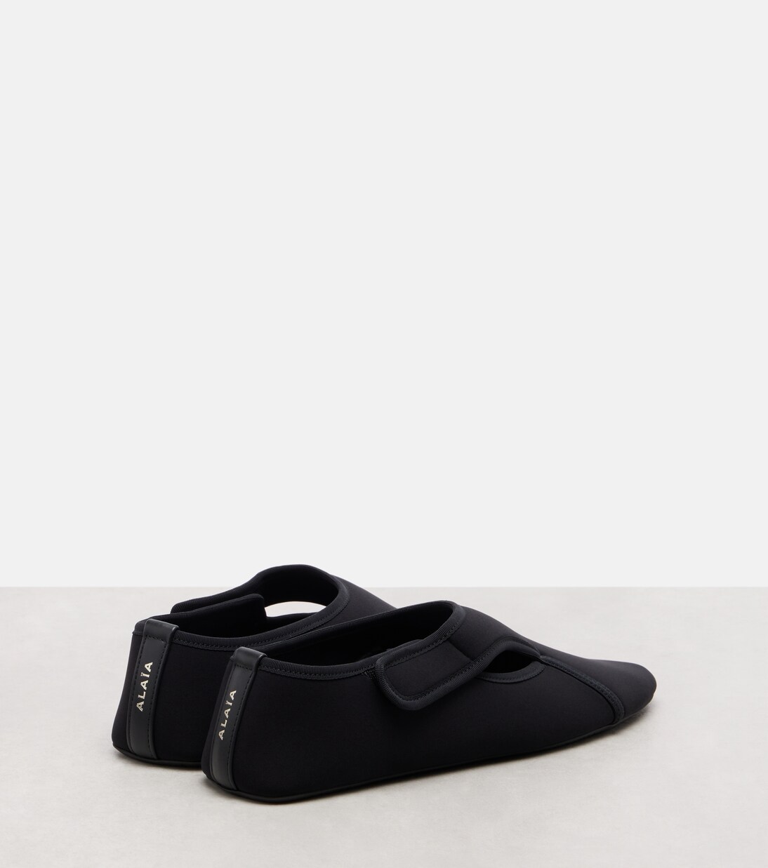 Flex leather-trimmed ballet flats | Alaïa