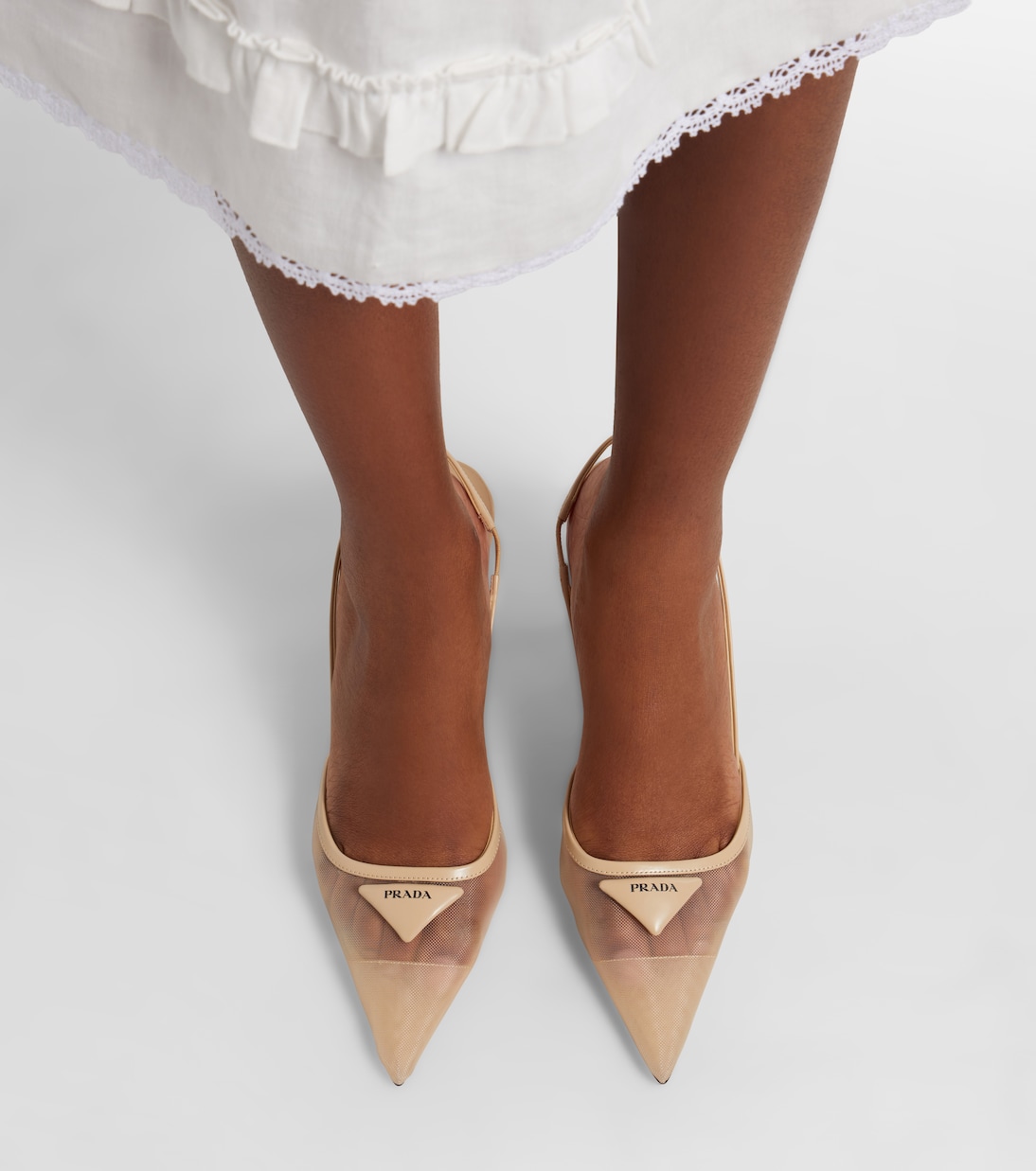 Leather-trimmed mesh slingback pumps | Prada