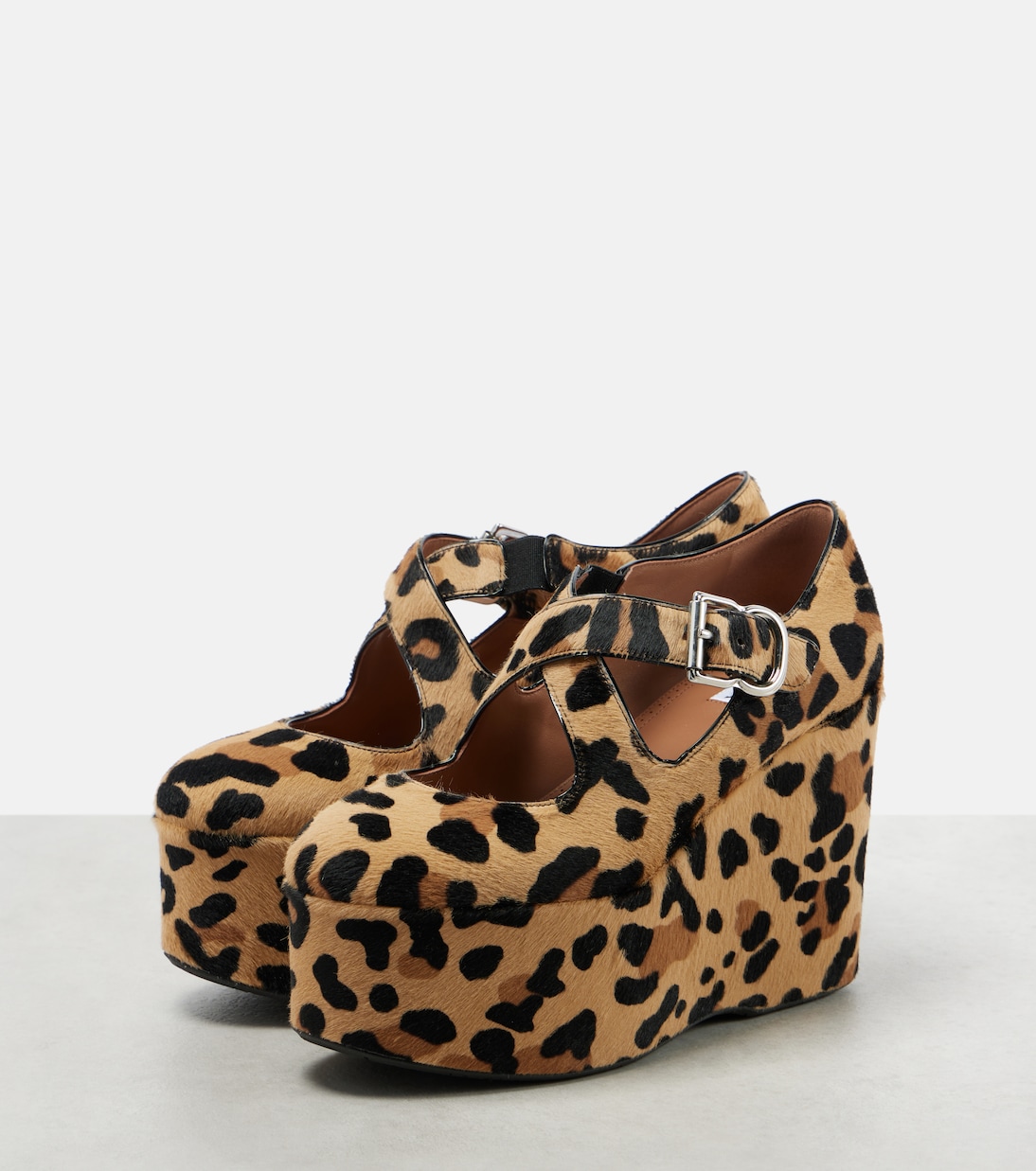 Pumps con zeppa Criss Cross in cavallino | Alaïa