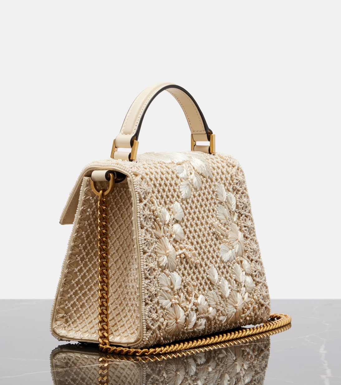 VSling Mini embellished top-handle bag | Valentino Garavani