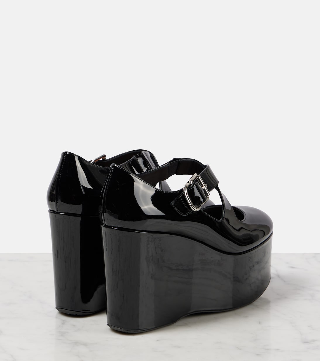 Escarpins compensés Criss Cross en cuir verni | Alaïa