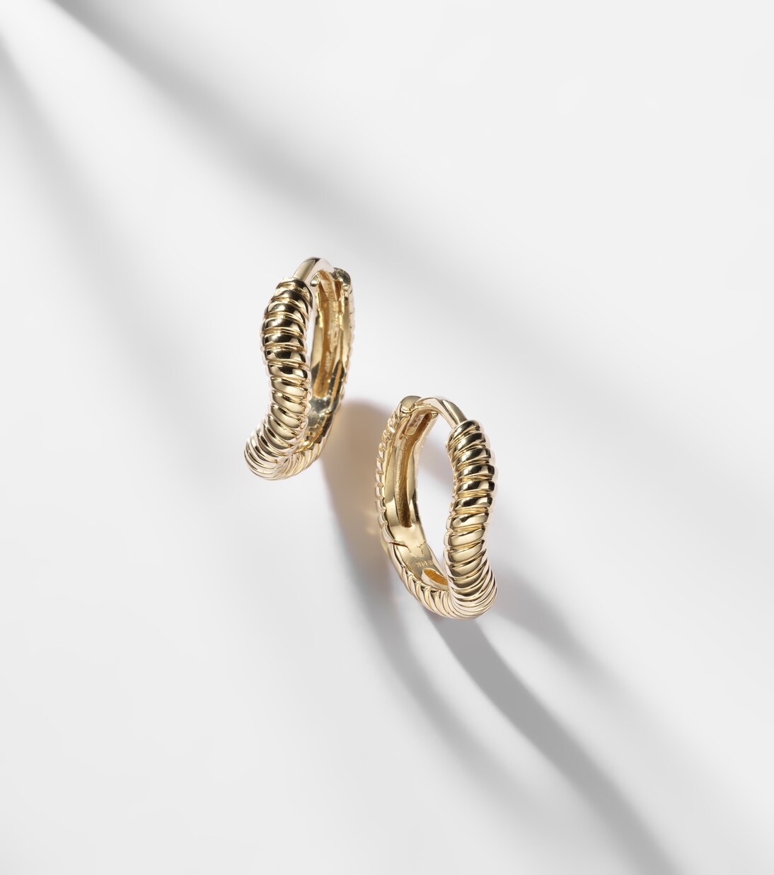 Freddie 14kt gold huggie earrings | Stone and Strand