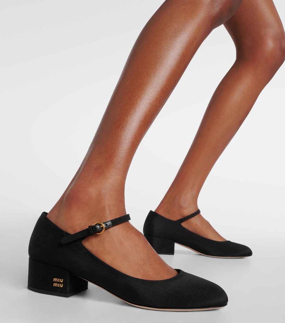 Canvas leather-lined Mary Jane pumps | Miu Miu