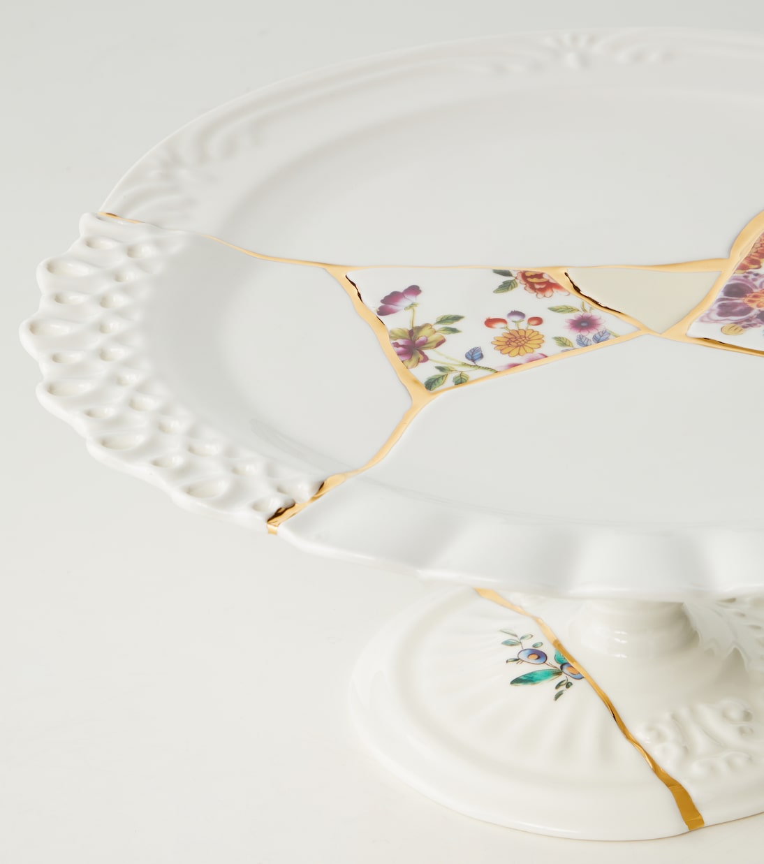 Kintsugi gold-plated porcelain cake stand by Marcantonio Raimondi Malerba | Seletti