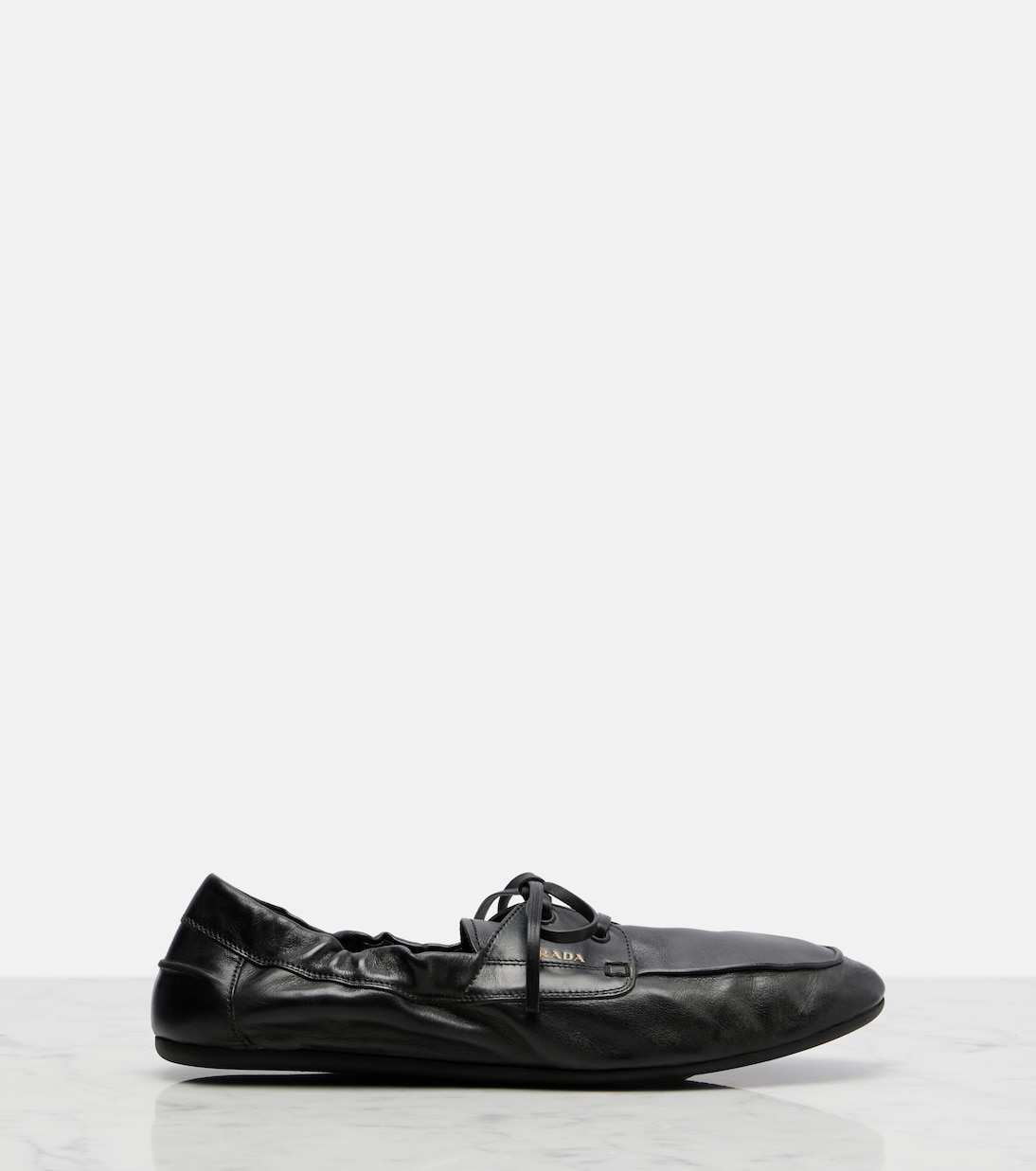 Shuffle leather boat shoes | Prada