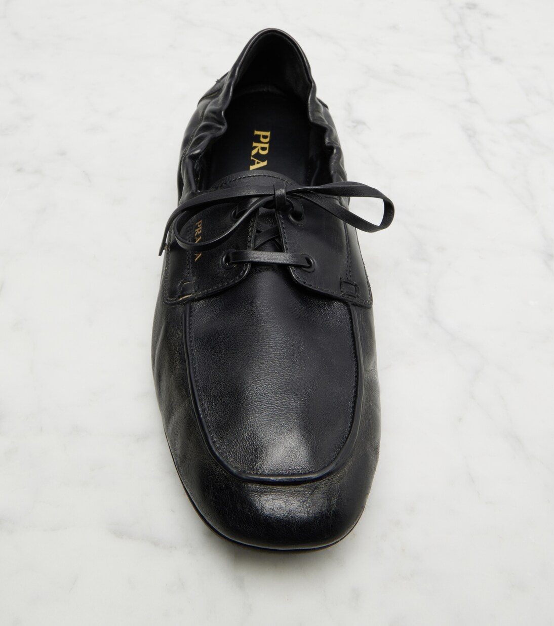 Shuffle leather boat shoes | Prada