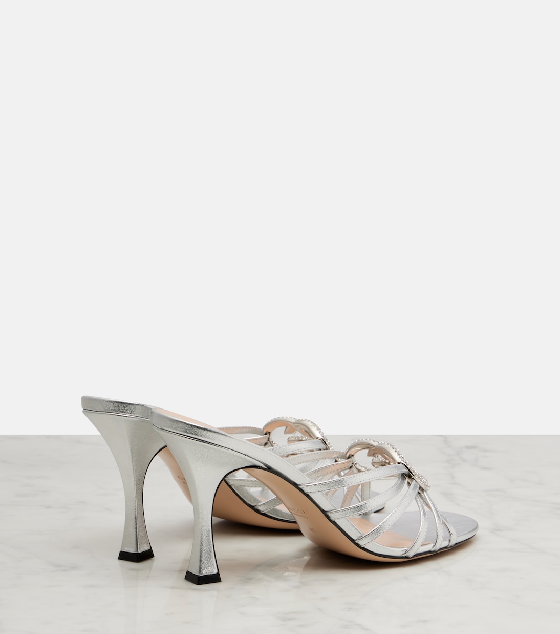 Mules 85 de piel metalizada con GG | Gucci