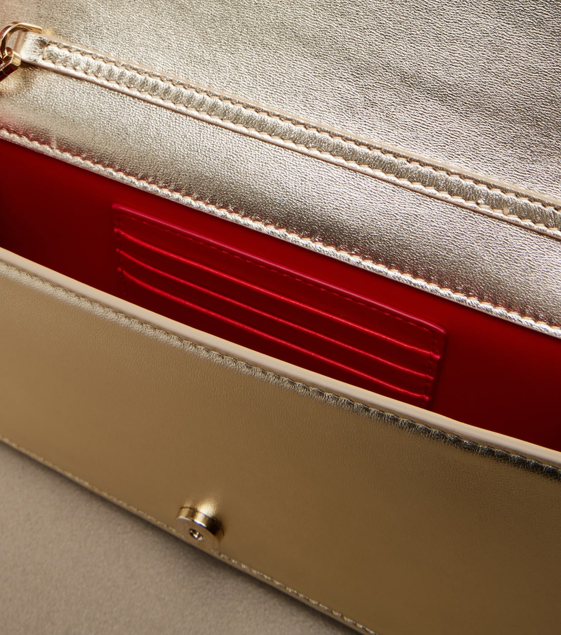 Bettina Small metallic leather clutch | Christian Louboutin