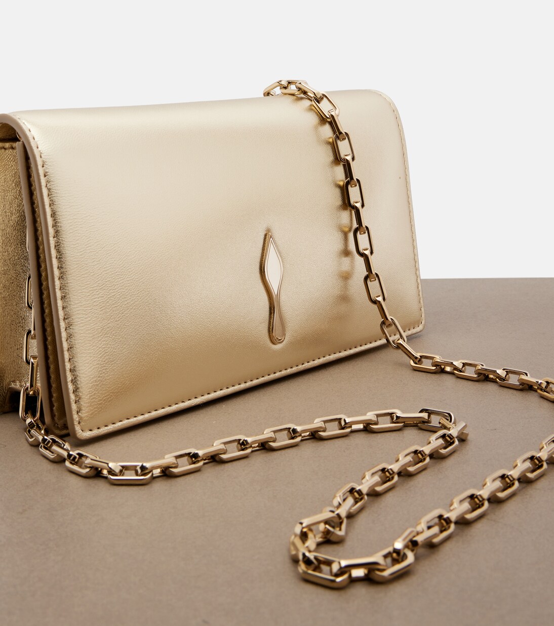 Bettina Small metallic leather clutch | Christian Louboutin