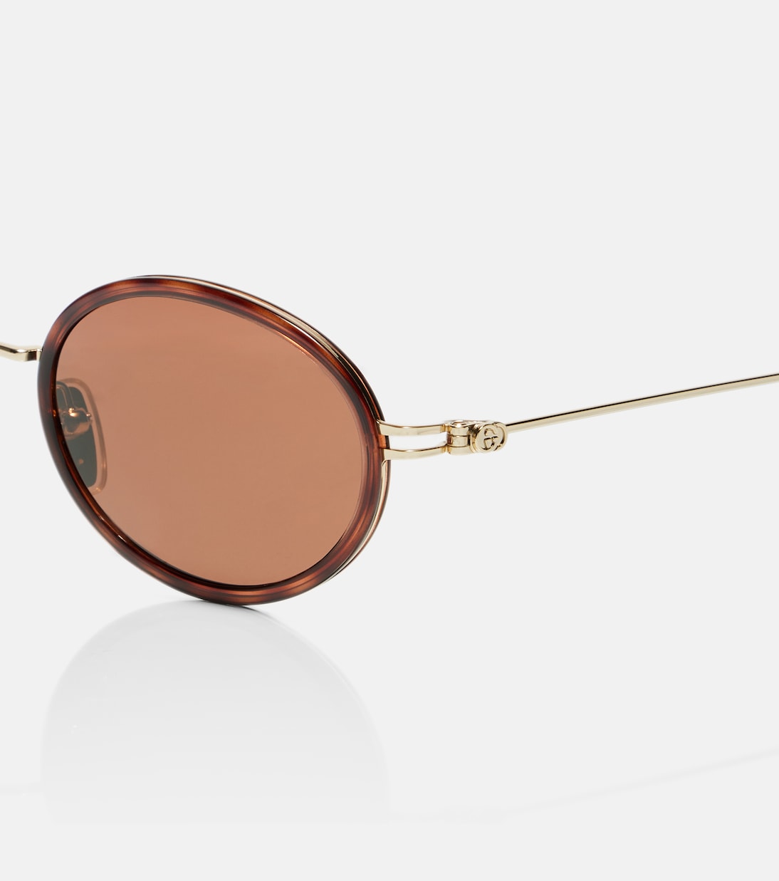 Ovale Sonnenbrille GG Tiny | Gucci