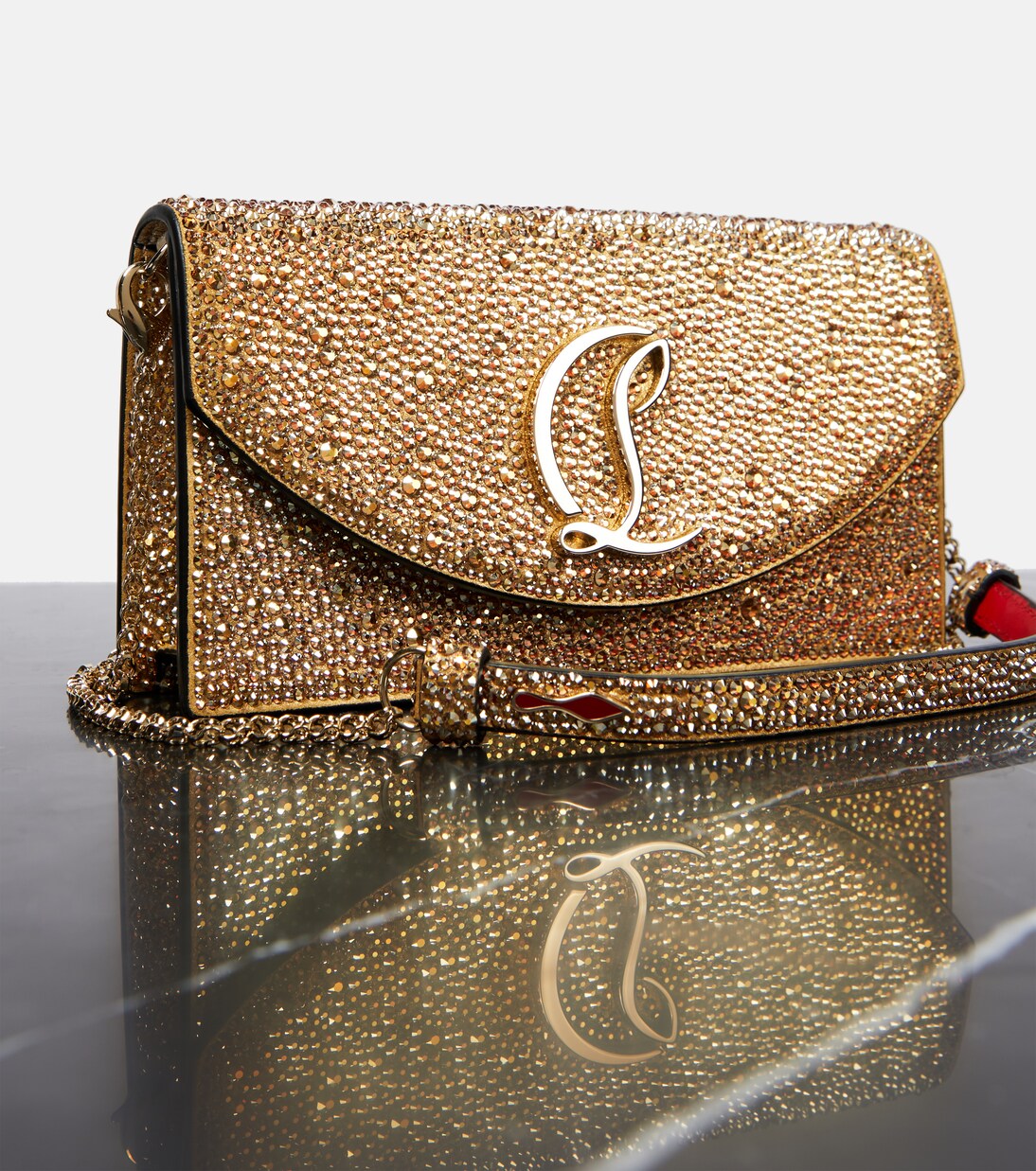 Loubi54 Small embellished leather clutch | Christian Louboutin