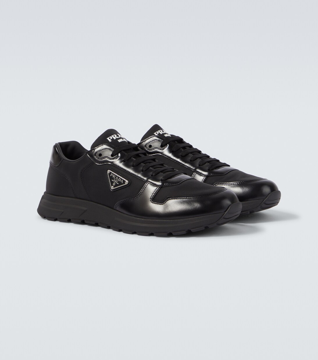 Logo leather-trimmed sneakers | Prada