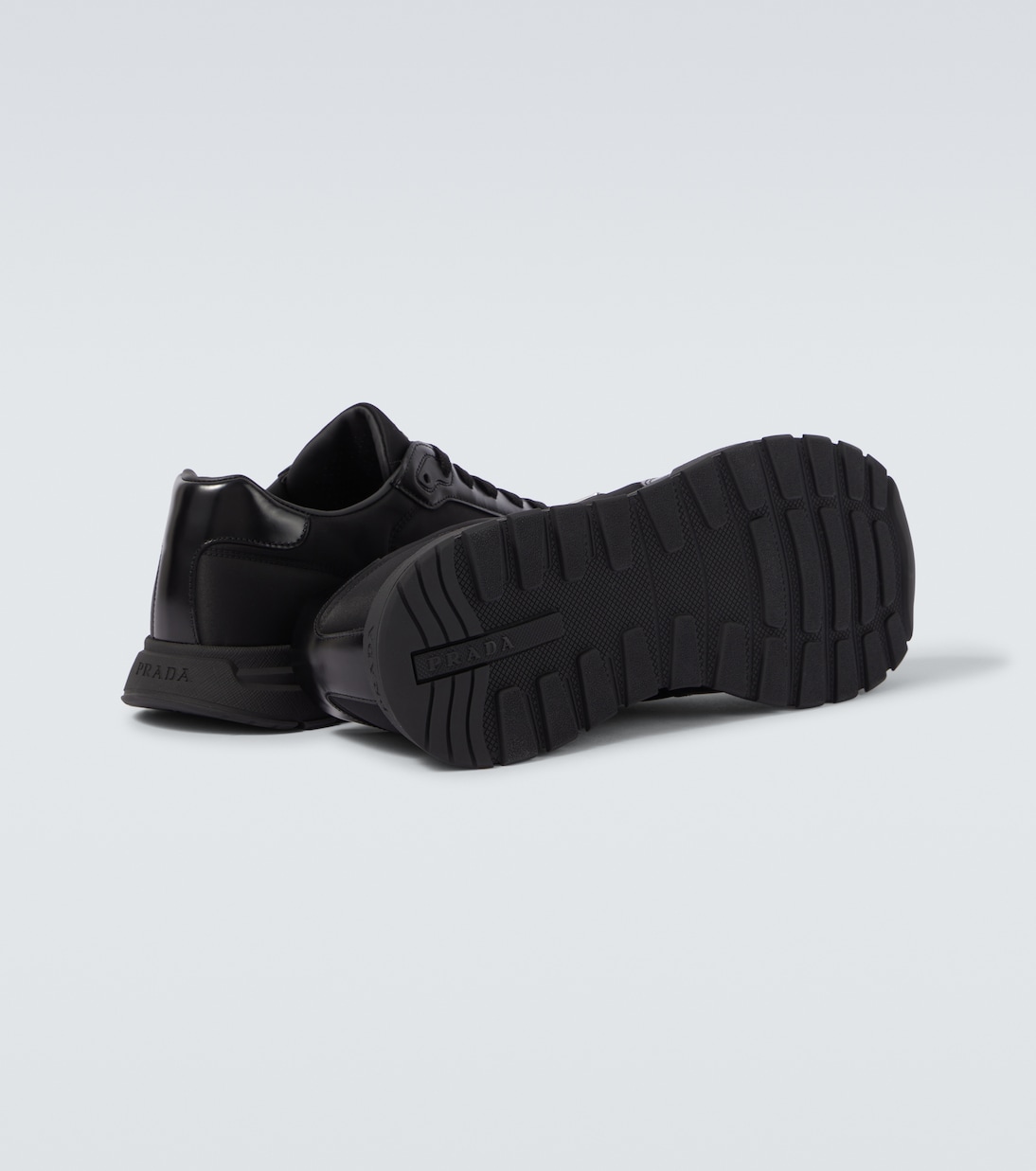 Logo leather-trimmed sneakers | Prada