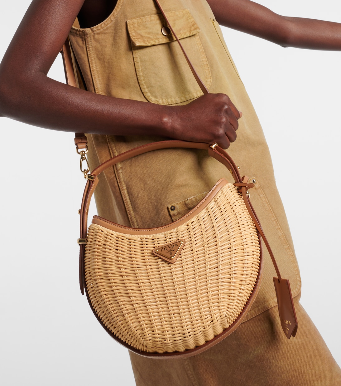 Arqué woven leather-trimmed shoulder bag | Prada