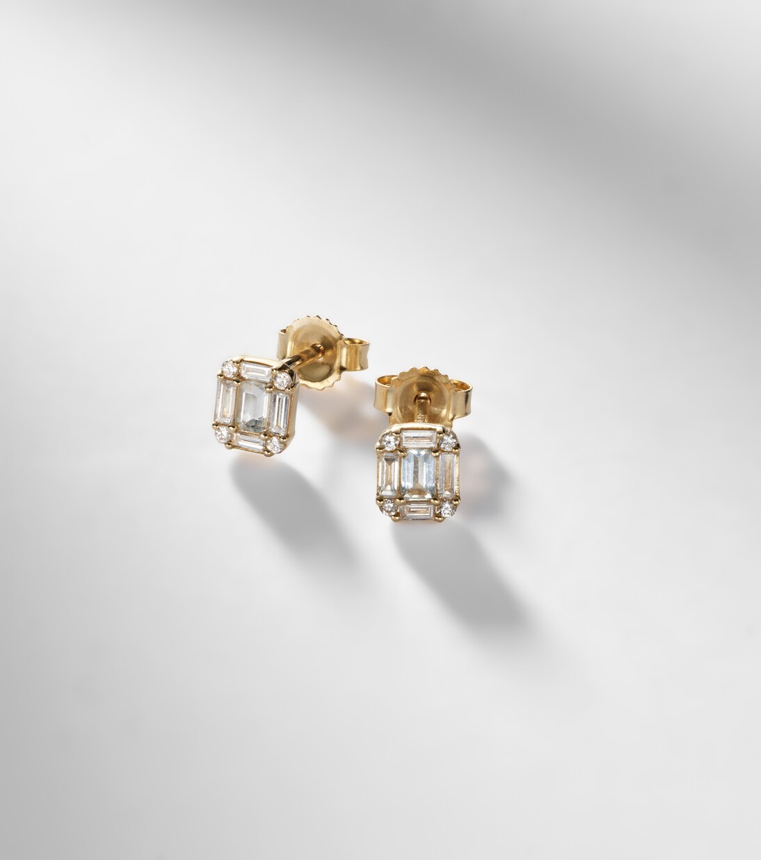 Shield Of Strength 14kt gold earrings with diamonds and aquamarine | Stone and Strand