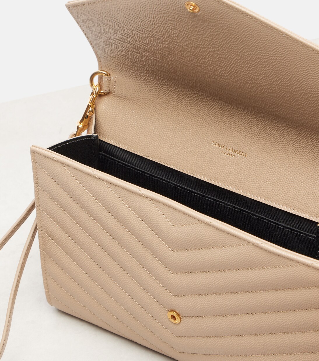 Cassandre Small matelassé leather clutch | Saint Laurent