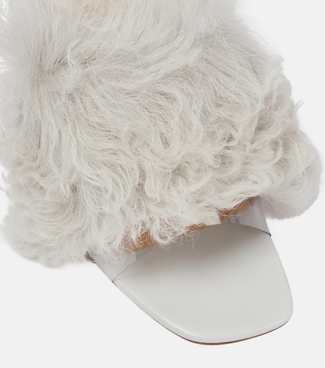 Mules en shearling et PVC | Magda Butrym