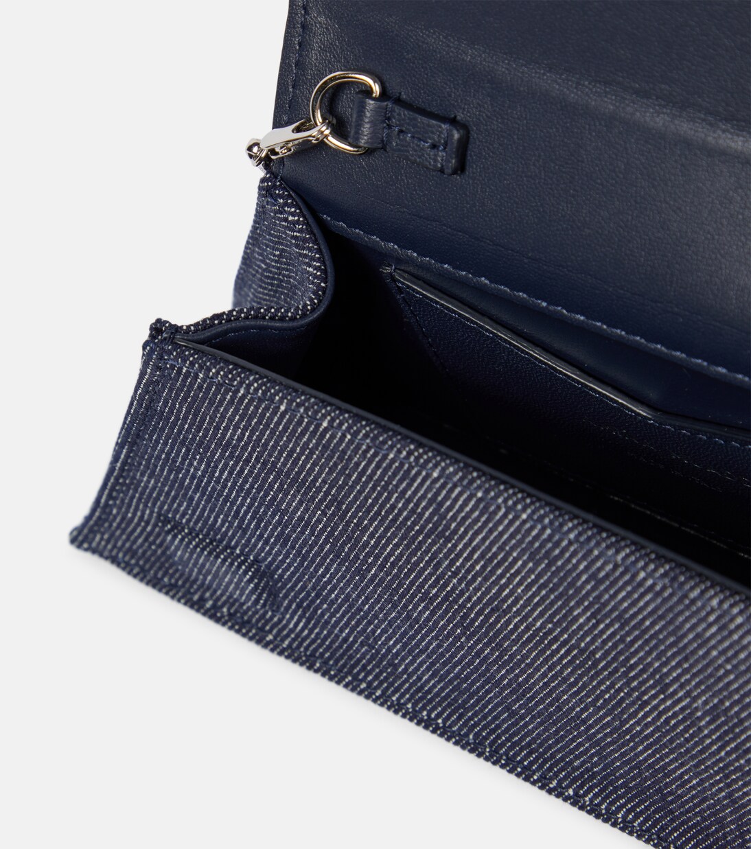 Superamini Yigit denim clutch | Amina Muaddi