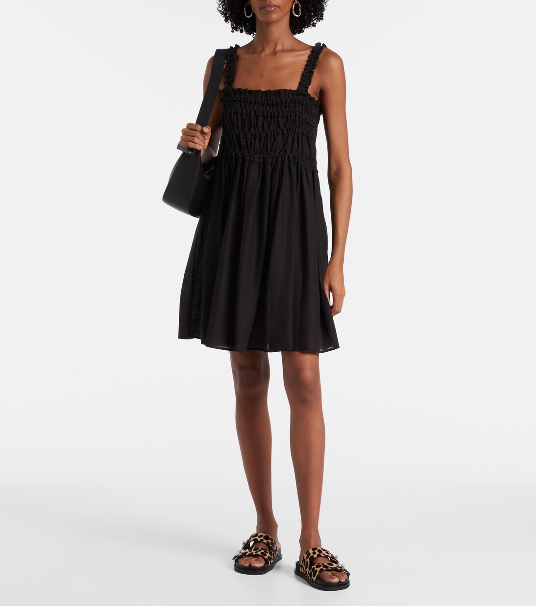 Turnlock leopard-print calf hair slides | Tory Burch