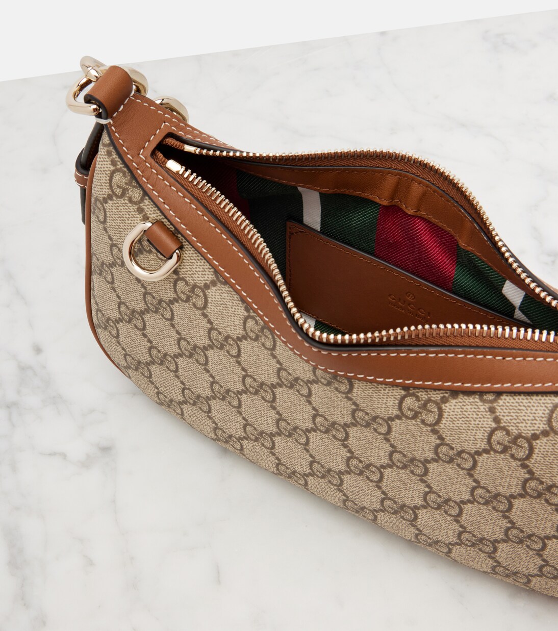 GG Emblem Small canvas shoulder bag | Gucci