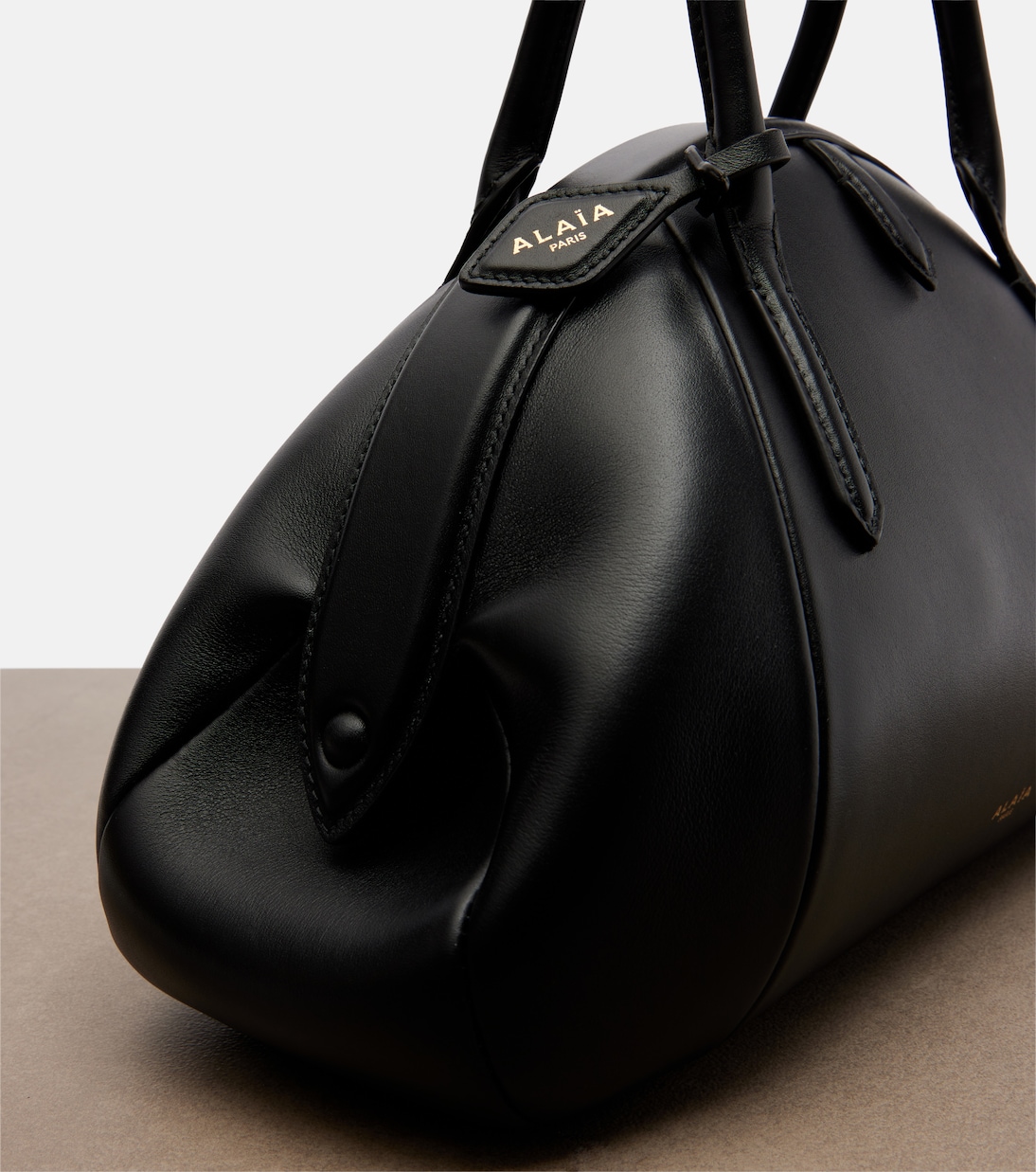 Purse Small leather top-handle bag | Alaïa