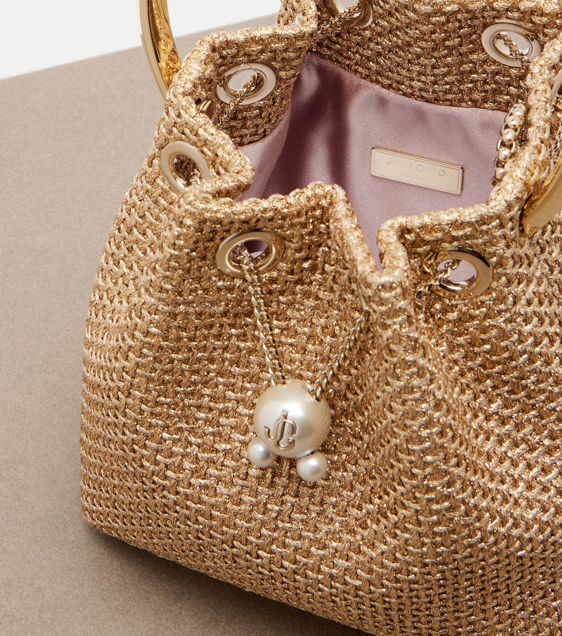 Bon Bon Small raffia-effect bucket bag | Jimmy Choo