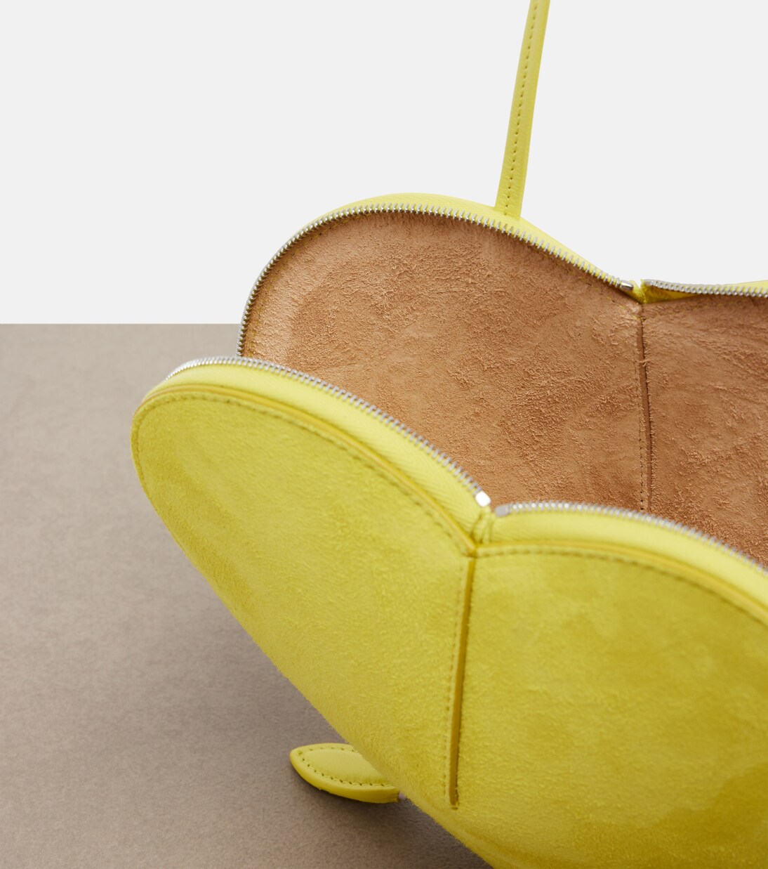 Le Cœur leather and suede crossbody bag | Alaïa