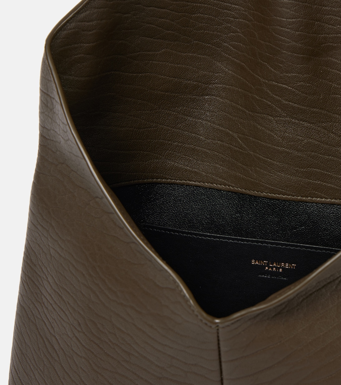 Cassandre Large leather clutch | Saint Laurent