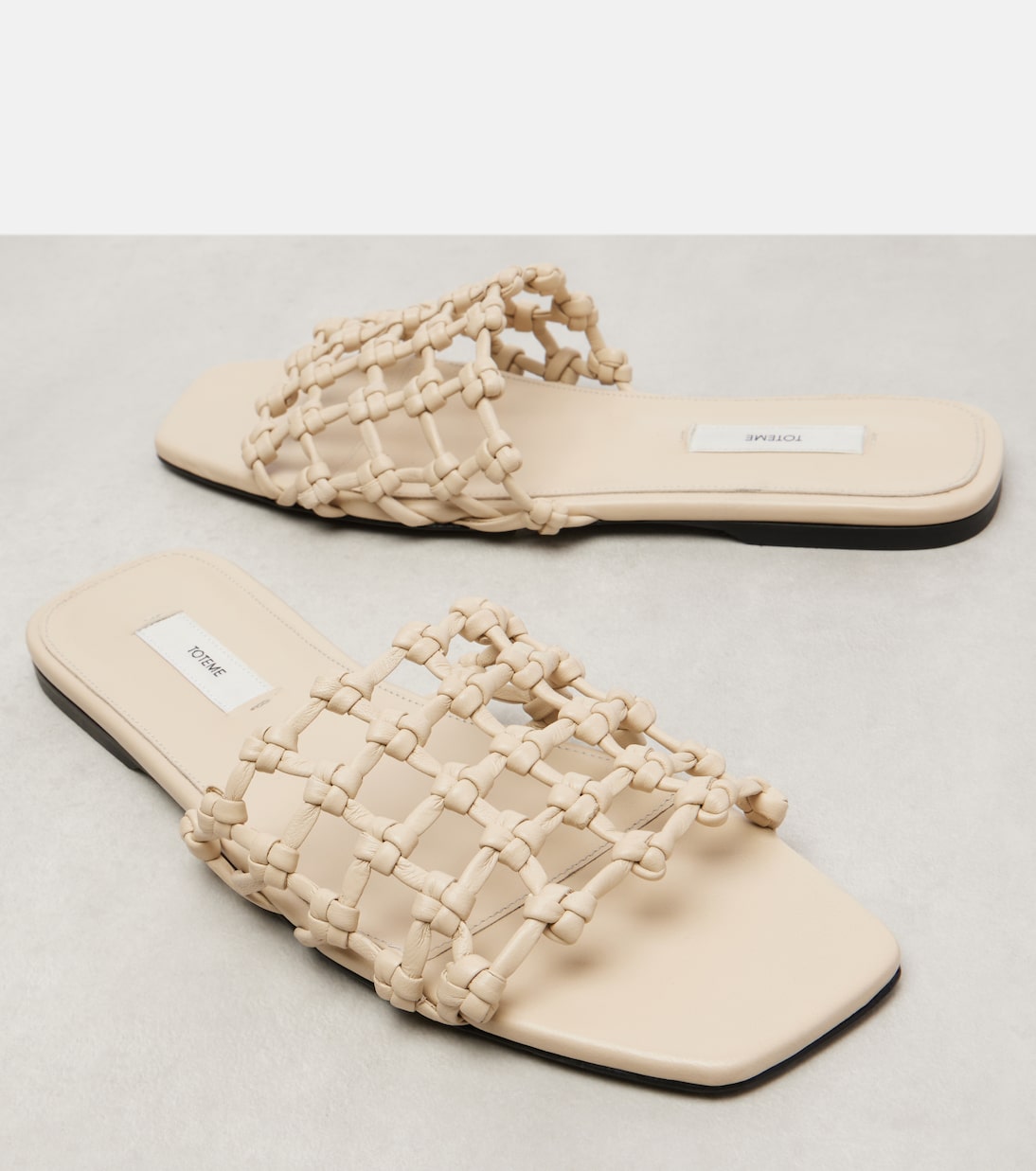 Woven leather slides | Toteme