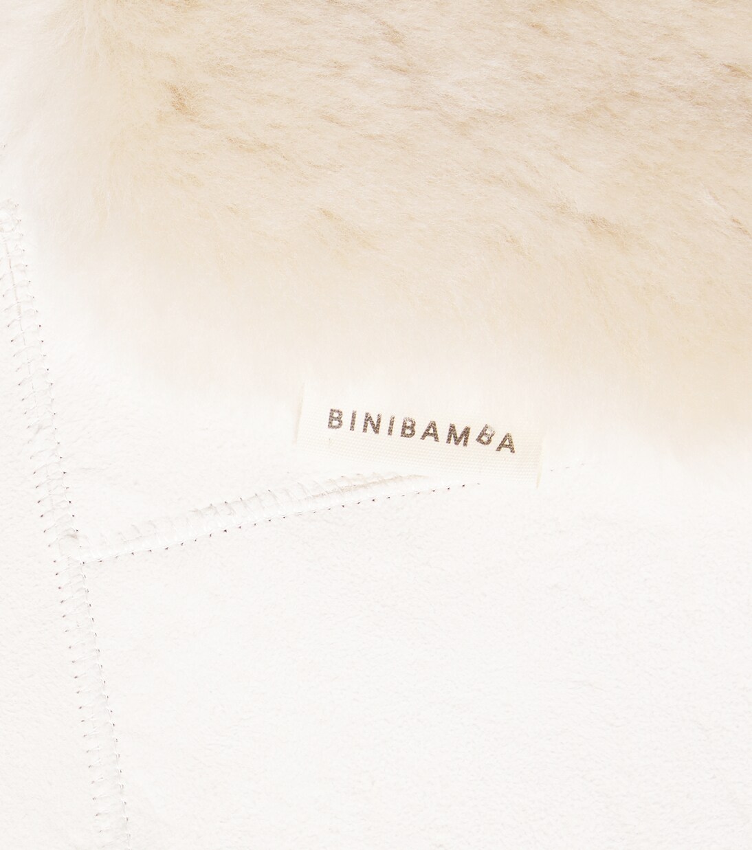 Baby Snuggler® shearling stroller liner | Binibamba