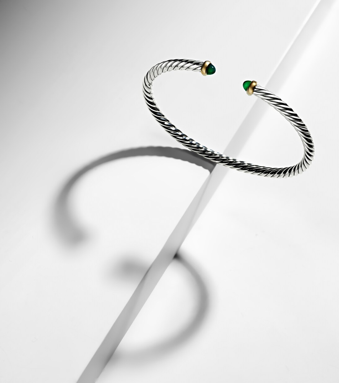 Cable Flex® sterling silver and 14kt gold cuff bracelet with onyxes | David Yurman