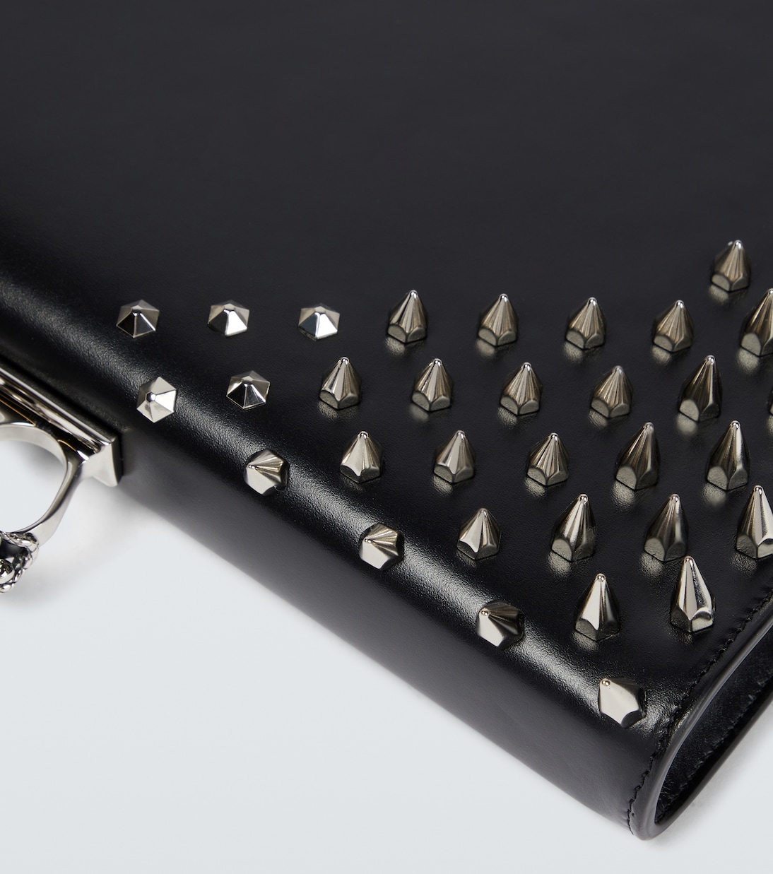 Four-Ring embellished leather clutch | McQueen
