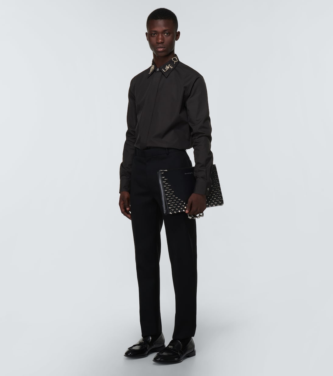 Four-Ring embellished leather clutch | McQueen