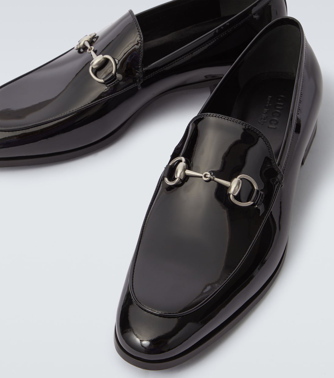 Horsebit patent leather loafers | Gucci
