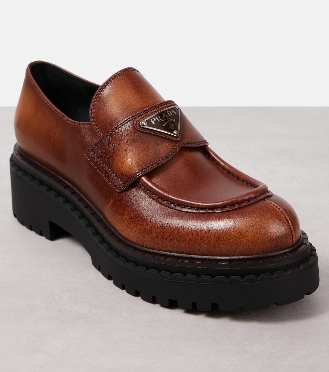 Logo leather platform loafers | Prada