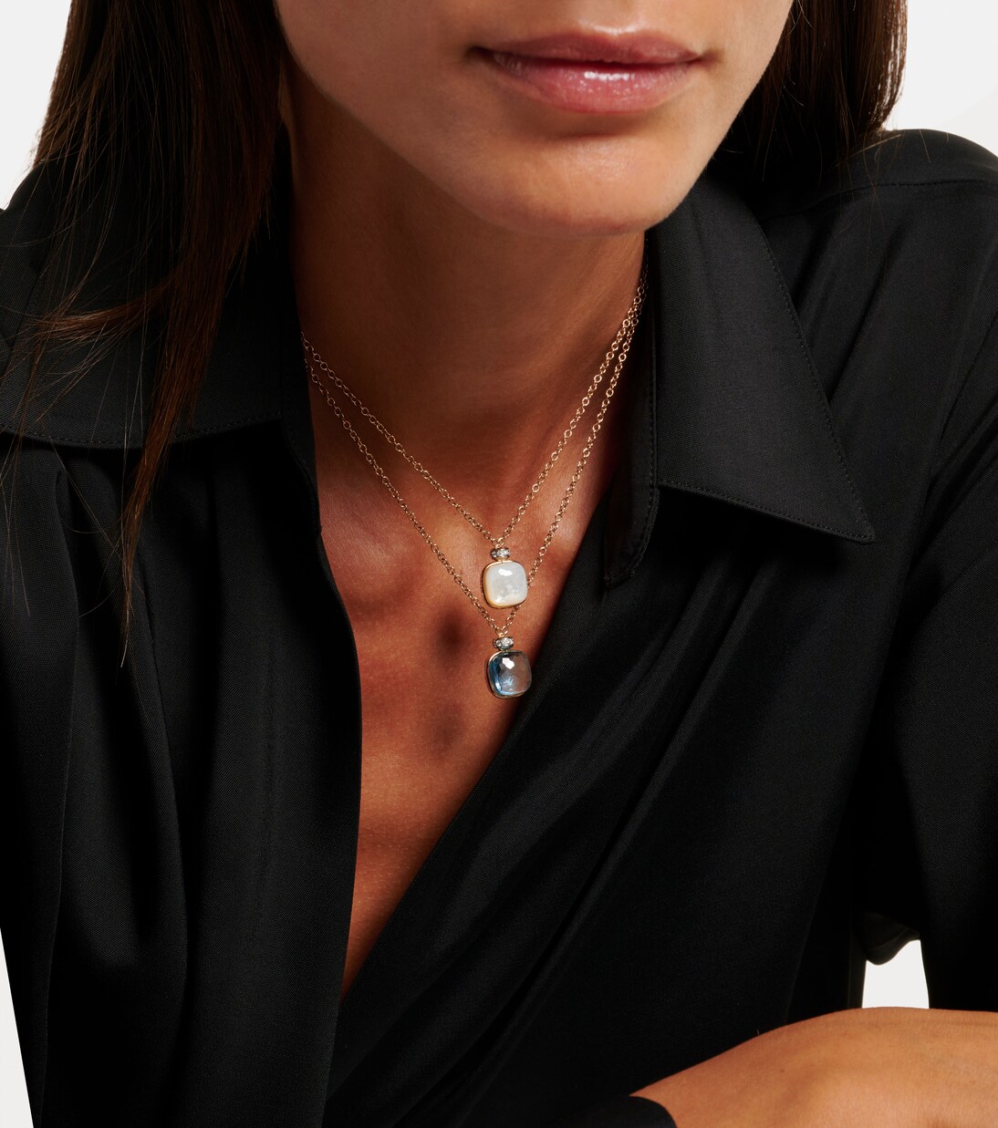 Halskette Nudo Classic aus 18kt Rosé- und Weißgold mit Diamanten und Topas | Pomellato