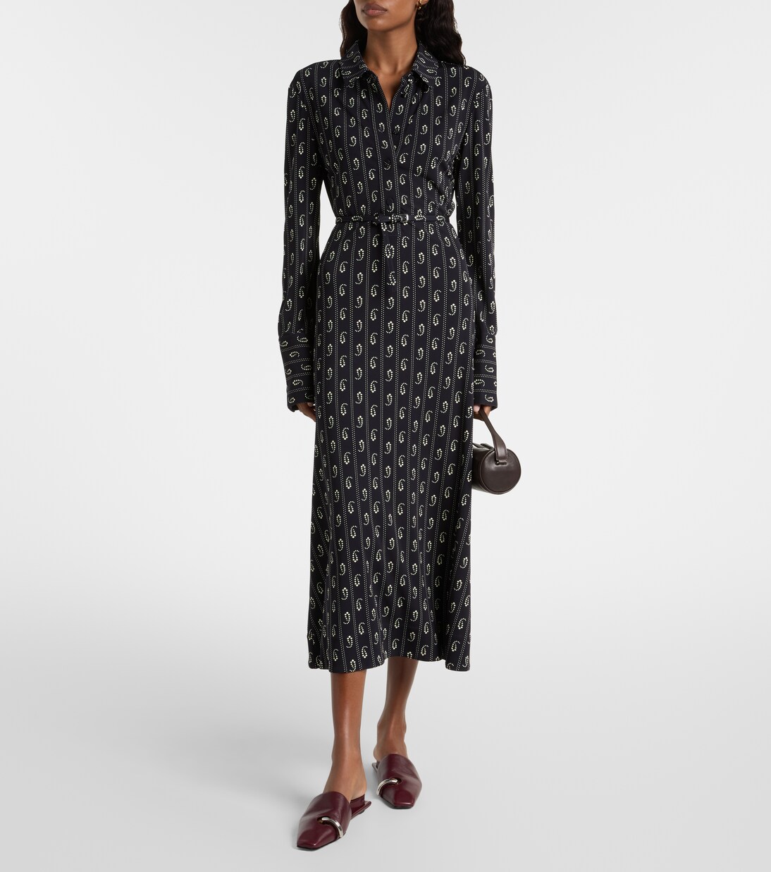 Pierced leather mules | Tory Burch