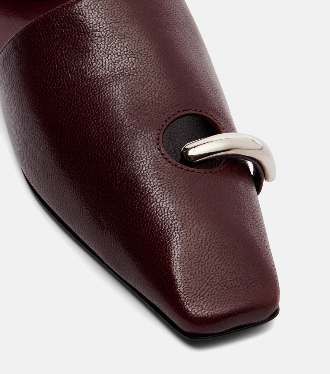 Pierced leather mules | Tory Burch